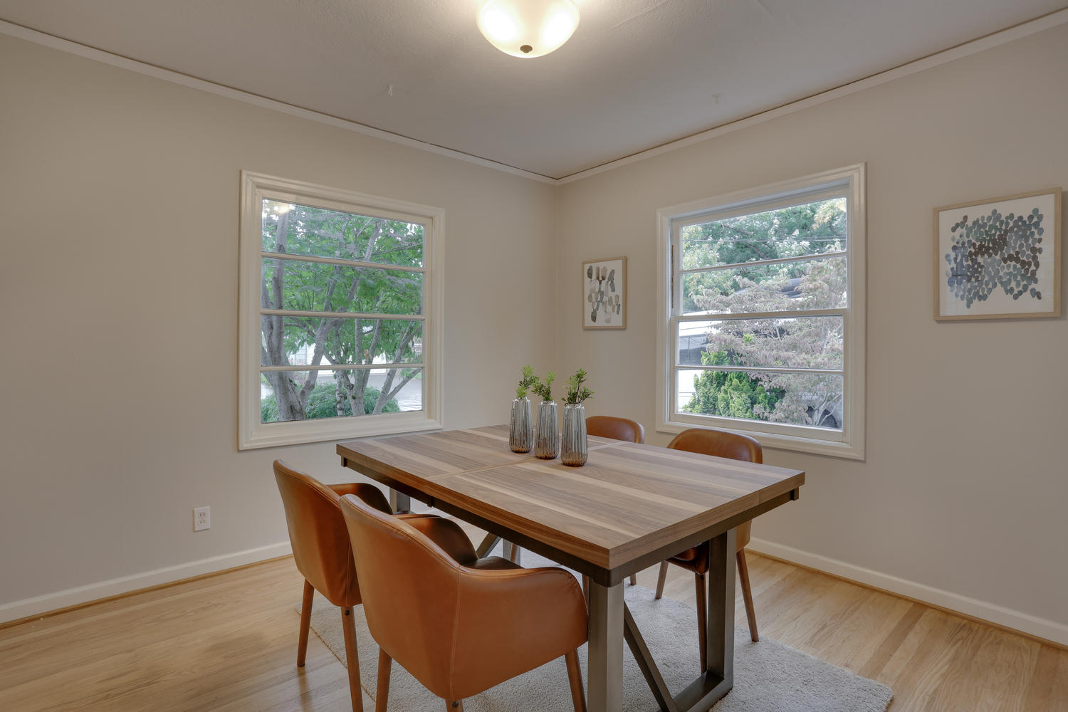 Portland, Oregon dining room after staging from Dennison Capen Group.